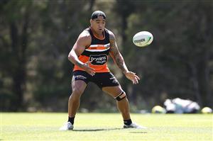 SYDNEY, AUSTRALIA - DECEMBER 07: Joe Ofahengaue catches the ball during a drill at the Wests Tigers NRL training session at St. Luke's Park North on December 07, 2020 in Sydney, Australia. (Photo by Mark Kolbe/Getty Images)