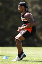 SYDNEY, AUSTRALIA - DECEMBER 07: Joe Ofahengaue runs during a drill at the Wests Tigers NRL training session at St. Luke's Park North on December 07, 2020 in Sydney, Australia. (Photo by Mark Kolbe/Getty Images)