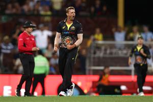 SYDNEY, AUSTRALIA - DECEMBER 06: Daniel Sams of Australia celebrates getting the wicket of Virat Kohli of India during game two of the Twenty20 International series between Australia and India at Sydney Cricket Ground on December 06, 2020 in Sydney, Australia. (Photo by Ryan Pierse/Getty Images)