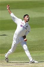 SYDNEY, AUSTRALIA - DECEMBER 07: Kartik Tyagi of India A bowls during day two of the three-day tour match between Australia A and India A at Drummoyne Oval on December 07, 2020 in Sydney, Australia. (Photo by Mark Metcalfe/Getty Images)