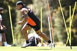 SYDNEY, AUSTRALIA - DECEMBER 07: Joe Ofahengaue runs during a drill at the Wests Tigers NRL training session at St. Luke's Park North on December 07, 2020 in Sydney, Australia. (Photo by Mark Kolbe/Getty Images)