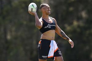 SYDNEY, AUSTRALIA - DECEMBER 07: Michael Chee-Kam throws a ball during the Wests Tigers NRL training session at St. Luke's Park North on December 07, 2020 in Sydney, Australia. (Photo by Mark Kolbe/Getty Images)