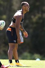 SYDNEY, AUSTRALIA - DECEMBER 07: Michael Chee-Kam share a laugh with his team mates during the Wests Tigers NRL training session at St. Luke's Park North on December 07, 2020 in Sydney, Australia. (Photo by Mark Kolbe/Getty Images)