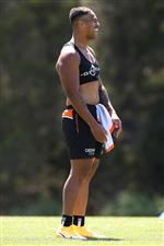 SYDNEY, AUSTRALIA - DECEMBER 07: Michael Chee-Kam share a laugh with his team mates during the Wests Tigers NRL training session at St. Luke's Park North on December 07, 2020 in Sydney, Australia. (Photo by Mark Kolbe/Getty Images)