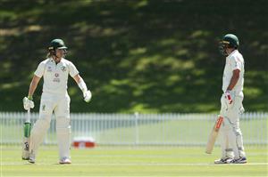SYDNEY, AUSTRALIA - DECEMBER 07: Joe Burns and Will Pucovski of Australia A talk as they bat during day two of the three-day tour match between Australia A and India A at Drummoyne Oval on December 07, 2020 in Sydney, Australia. (Photo by Mark Metcalfe/Getty Images)
