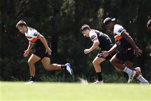 SYDNEY, AUSTRALIA - DECEMBER 07: Luke Brooks runs during a drill at the Wests Tigers NRL training session at St. Luke's Park North on December 07, 2020 in Sydney, Australia. (Photo by Mark Kolbe/Getty Images)