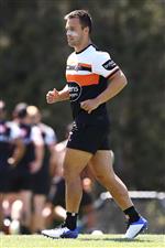 SYDNEY, AUSTRALIA - DECEMBER 07: Luke Brooks looks on during the Wests Tigers NRL training session at St. Luke's Park North on December 07, 2020 in Sydney, Australia. (Photo by Mark Kolbe/Getty Images)