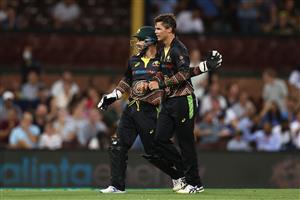 SYDNEY, AUSTRALIA - DECEMBER 06: Mitch Swepson of Australia is congratulated by Matthew Wade after getting the wicket of Sanju Samson of India during game two of the Twenty20 International series between Australia and India at Sydney Cricket Ground on December 06, 2020 in Sydney, Australia. (Photo by Ryan Pierse/Getty Images)
