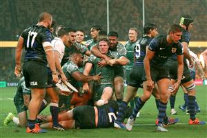SYDNEY, AUSTRALIA - DECEMBER 05: Michael Hooper of the Wallabies is congratulated by team mates after scoring a try during the 2020 Tri-Nations match between the Australian Wallabies and the Argentina Pumas at Bankwest Stadium on December 05, 2020 in Sydney, Australia. (Photo by Cameron Spencer/Getty Images)