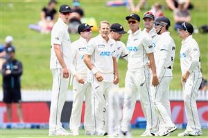 HAMILTON, NEW ZEALAND - DECEMBER 06: Neil Wagner of New Zealand is congratulated by team mates after taking the final wicket during day four of the First Test match in the series between New Zealand and the West Indies at Seddon Park on December 06, 2020 in Hamilton, New Zealand. (Photo by Kai Schwoerer/Getty Images)