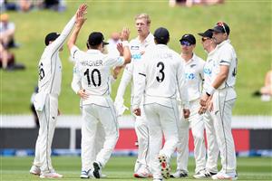HAMILTON, NEW ZEALAND - DECEMBER 06: Kyle Jamieson of New Zealand is congratulated by team mates after dismissing Alzarri Joseph of the West Indies during day four of the First Test match in the series between New Zealand and the West Indies at Seddon Park on December 06, 2020 in Hamilton, New Zealand. (Photo by Kai Schwoerer/Getty Images)