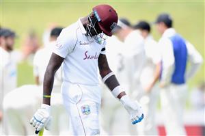 HAMILTON, NEW ZEALAND - DECEMBER 06: Alzarri Joseph of the West Indies looks dejected after being dismissed by Kyle Jamieson of New Zealand during day four of the First Test match in the series between New Zealand and the West Indies at Seddon Park on December 06, 2020 in Hamilton, New Zealand. (Photo by Kai Schwoerer/Getty Images)