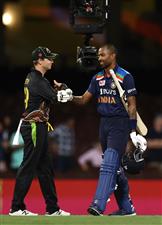 SYDNEY, AUSTRALIA - DECEMBER 06: Hardik Pandya of India is congratulated by Steve Smith of Australia during game two of the Twenty20 International series between Australia and India at Sydney Cricket Ground on December 06, 2020 in Sydney, Australia. (Photo by Ryan Pierse/Getty Images)