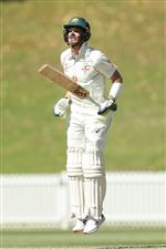 SYDNEY, AUSTRALIA - DECEMBER 07: Tim Paine of Australia A reacts after being struck by a delivery during day two of the three-day tour match between Australia A and India A at Drummoyne Oval on December 07, 2020 in Sydney, Australia. (Photo by Mark Metcalfe/Getty Images)