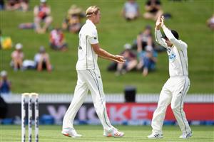 HAMILTON, NEW ZEALAND - DECEMBER 06: Kyle Jamieson of New Zealand (L) is congratulated by Tom Latham of New Zealand after dismissing Alzarri Joseph of the West Indies during day four of the First Test match in the series between New Zealand and the West Indies at Seddon Park on December 06, 2020 in Hamilton, New Zealand. (Photo by Kai Schwoerer/Getty Images)