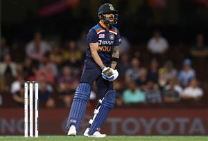 SYDNEY, AUSTRALIA - DECEMBER 06: Virat Kohli of India reacts after missing a shot during game two of the Twenty20 International series between Australia and India at Sydney Cricket Ground on December 06, 2020 in Sydney, Australia. (Photo by Ryan Pierse/Getty Images)