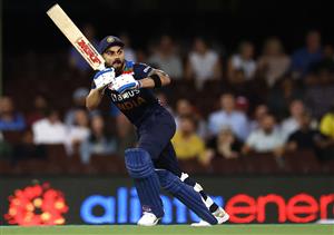 SYDNEY, AUSTRALIA - DECEMBER 06: Virat Kohli of India bats during game two of the Twenty20 International series between Australia and India at Sydney Cricket Ground on December 06, 2020 in Sydney, Australia. (Photo by Ryan Pierse/Getty Images)