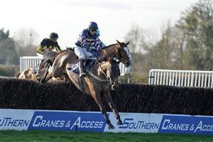 FONTWELL, ENGLAND - DECEMBER 08: Joshua Moore riding Bridle Loanan (blue/pink) on their way to winning The Thank You To The Cisswood Team Handicap Chase at Fontwell Park Racecourse on December 08, 2020 in Fontwell, England. Owners and a limited number of the public are allowed to attend the meeting due to the Coronavirus pandemic. (Photo by Alan Crowhurst/Getty Images)