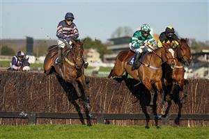 FONTWELL, ENGLAND - DECEMBER 08: Joshua Moore riding Bridle Loanan (blue/pink) on their way to winning The Thank You To The Cisswood Team Handicap Chase at Fontwell Park Racecourse on December 08, 2020 in Fontwell, England. Owners and a limited number of the public are allowed to attend the meeting due to the Coronavirus pandemic. (Photo by Alan Crowhurst/Getty Images)
