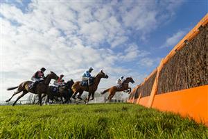 FONTWELL, ENGLAND - DECEMBER 08: Jamie Moore riding Nassalam (R) on their way to winning The One More For The Moore's Juvenile Hurdle at Fontwell Park Racecourse on December 08, 2020 in Fontwell, England. Owners and a limited number of the public are allowed to attend the meeting due to the Coronavirus pandemic. (Photo by Alan Crowhurst/Getty Images)