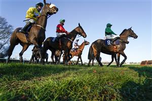 FONTWELL, ENGLAND - DECEMBER 08: A general view as runners circle at the start for The Christmas Offers At Champagne Piaff Novices' Handicap Hurdle at Fontwell Park Racecourse on December 08, 2020 in Fontwell, England. Owners and a limited number of the public are allowed to attend the meeting due to the Coronavirus pandemic. (Photo by Alan Crowhurst/Getty Images)