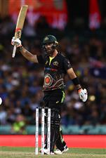 SYDNEY, AUSTRALIA - DECEMBER 08: Glenn Maxwell of Australia celebrates after reaching his half century during game three of the Twenty20 International series between Australia and India at Sydney Cricket Ground on December 08, 2020 in Sydney, Australia. (Photo by Ryan Pierse/Getty Images)