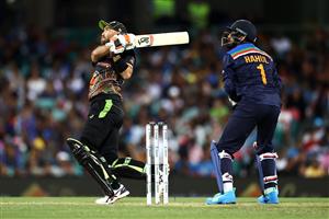 SYDNEY, AUSTRALIA - DECEMBER 08: Glenn Maxwell of Australia bats during game three of the Twenty20 International series between Australia and India at Sydney Cricket Ground on December 08, 2020 in Sydney, Australia. (Photo by Cameron Spencer/Getty Images)