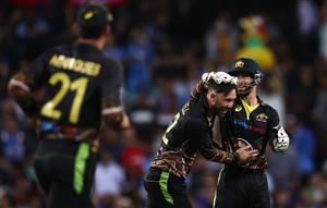 SYDNEY, AUSTRALIA - DECEMBER 08: Glenn Maxwell of Australia celebrates after taking the wicket of KL Rahul of India during game three of the Twenty20 International series between Australia and India at Sydney Cricket Ground on December 08, 2020 in Sydney, Australia. (Photo by Ryan Pierse/Getty Images)