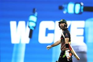 SYDNEY, AUSTRALIA - DECEMBER 08: Glenn Maxwell of Australia is leaves the field after being dismissed by Thangarasu Natarajan of India during game three of the Twenty20 International series between Australia and India at Sydney Cricket Ground on December 08, 2020 in Sydney, Australia. (Photo by Cameron Spencer/Getty Images)