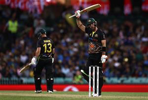 SYDNEY, AUSTRALIA - DECEMBER 08: Glenn Maxwell of Australia celebrates after reaching his half century during game three of the Twenty20 International series between Australia and India at Sydney Cricket Ground on December 08, 2020 in Sydney, Australia. (Photo by Ryan Pierse/Getty Images)