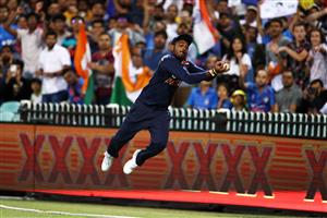 SYDNEY, AUSTRALIA - DECEMBER 08: Sanju Samson of India catches Glenn Maxwell of Australia beyond the boundary rope during game three of the Twenty20 International series between Australia and India at Sydney Cricket Ground on December 08, 2020 in Sydney, Australia. (Photo by Cameron Spencer/Getty Images)