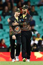 SYDNEY, AUSTRALIA - DECEMBER 08: Steve Smith of Australia is congratulated by Glenn Maxwell of Australia after catching Sanju Samson of India during game three of the Twenty20 International series between Australia and India at Sydney Cricket Ground on December 08, 2020 in Sydney, Australia. (Photo by Cameron Spencer/Getty Images)