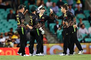SYDNEY, AUSTRALIA - DECEMBER 08: Steve Smith of Australia celebrates catching Sanju Samson of India off a delivery by Mitchell Swepson of Australia during game three of the Twenty20 International series between Australia and India at Sydney Cricket Ground on December 08, 2020 in Sydney, Australia. (Photo by Cameron Spencer/Getty Images)