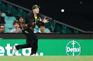 SYDNEY, AUSTRALIA - DECEMBER 08: Steve Smith of Australia catches Sanju Samson of India off a delivery by Mitchell Swepson of Australia during game three of the Twenty20 International series between Australia and India at Sydney Cricket Ground on December 08, 2020 in Sydney, Australia. (Photo by Cameron Spencer/Getty Images)