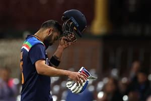 SYDNEY, AUSTRALIA - DECEMBER 08: Virat Kohli of India looks dejected after being dismissed by Andrew Tye of Australia during game three of the Twenty20 International series between Australia and India at Sydney Cricket Ground on December 08, 2020 in Sydney, Australia. (Photo by Ryan Pierse/Getty Images)