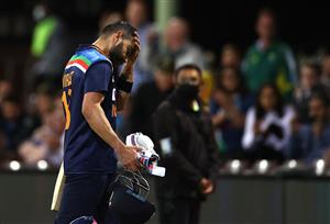 SYDNEY, AUSTRALIA - DECEMBER 08: Virat Kohli of India looks dejected after being dismissed by Andrew Tye of Australia during game three of the Twenty20 International series between Australia and India at Sydney Cricket Ground on December 08, 2020 in Sydney, Australia. (Photo by Ryan Pierse/Getty Images)