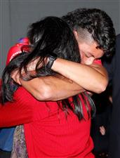 MELBOURNE, AUSTRALIA - DECEMBER 09: Connor Downie celebrates with his parents after his name is read out during the NAB AFL Draft on December 09, 2020 in Melbourne, Australia. (Photo by Michael Willson/AFL Photos via Getty Images)