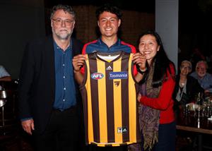MELBOURNE, AUSTRALIA - DECEMBER 09: Connor Downie celebrates with his parents after his name is read out during the NAB AFL Draft on December 09, 2020 in Melbourne, Australia. (Photo by Michael Willson/AFL Photos via Getty Images)