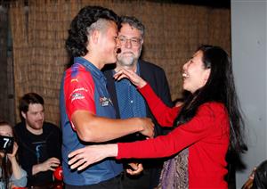 MELBOURNE, AUSTRALIA - DECEMBER 09: Connor Downie celebrates with his parents after his name is read out during the NAB AFL Draft on December 09, 2020 in Melbourne, Australia. (Photo by Michael Willson/AFL Photos via Getty Images)