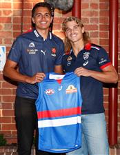 MELBOURNE, AUSTRALIA - DECEMBER 09: Jamarra Ugle-Hagan poses for a photograph with Bailey Smith after being announced as the number 1 pick during the NAB AFL Draft on December 09, 2020 in Melbourne, Australia. (Photo by Michael Willson/AFL Photos via Getty Images)