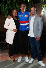 MELBOURNE, AUSTRALIA - DECEMBER 09: Jamarra Ugle-Hagan poses for a photograph with parents Alice and Aaron after being announced as the number 1 pick during the NAB AFL Draft on December 09, 2020 in Melbourne, Australia. (Photo by Michael Willson/AFL Photos via Getty Images)
