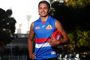 MELBOURNE, AUSTRALIA - DECEMBER 09: Jamarra Ugle-Hagan poses for a photograph in a Bulldogs jumper after being announced as the number 1 pick during the NAB AFL Draft on December 09, 2020 in Melbourne, Australia. (Photo by Michael Willson/AFL Photos via Getty Images)
