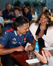 MELBOURNE, AUSTRALIA - DECEMBER 09: Jamarra Ugle-Hagan celebrates with family after being announced as the number 1 pick during the NAB AFL Draft on December 09, 2020 in Melbourne, Australia. (Photo by Michael Willson/AFL Photos via Getty Images)