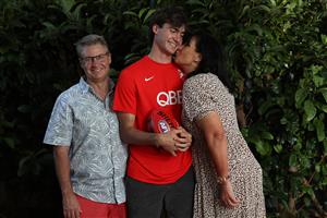 PERTH, AUSTRALIA - DECEMBER 09: Logan McDonald poses with his parents Darren and Victoria following the 2020 AFL Draft virtual event, at his home on December 09, 2020 in Perth, Australia. (Photo by Paul Kane/AFL Photos/via Getty Images)