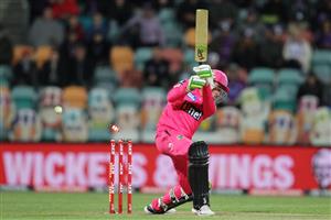 HOBART, AUSTRALIA - DECEMBER 10: Daniel Hughes of the Sixers is bowled by Riley Meredith of the Hurricanes during the Big Bash League match between the Hobart Hurricanes and Sydney Sixers at Blundstone Arena, on December 10, 2020, in Hobart, Australia. (Photo by Matt King/Getty Images)