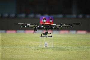 HOBART, AUSTRALIA - DECEMBER 10: A drone delivers the match ball during the Big Bash League match between the Hobart Hurricanes and Sydney Sixers at Blundstone Arena, on December 10, 2020, in Hobart, Australia. (Photo by Matt King/Getty Images)