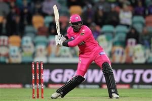 HOBART, AUSTRALIA - DECEMBER 10: Carlos Brathwaite of the Sixers bats during the Big Bash League match between the Hobart Hurricanes and Sydney Sixers at Blundstone Arena, on December 10, 2020, in Hobart, Australia. (Photo by Matt King/Getty Images)