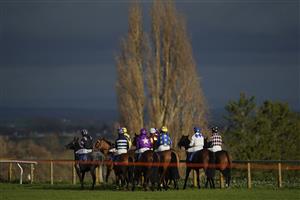 TAUNTON, ENGLAND - DECEMBER 10: Runners in The Stables Business Park Novices' Handicap Hurdle circle at the start at Taunton Racecourse on December 10, 2020 in Taunton, England. Owners and a limited number of the public are allowed to attend the meeting due to the Coronavirus pandemic. (Photo by Alan Crowhurst/Getty Images)
