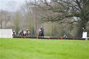 TAUNTON, ENGLAND - DECEMBER 10: Nathan Brennan riding Mount Windsor clear the second last to win The Dave Criddle Travel - Let's Fly Again Handicap Hurdle at Taunton Racecourse on December 10, 2020 in Taunton, England. Owners and a limited number of the public are allowed to attend the meeting due to the Coronavirus pandemic. (Photo by Alan Crowhurst/Getty Images)