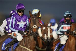 TAUNTON, ENGLAND - DECEMBER 10: Runners in The Stables Business Park Novices' Handicap Hurdle circle at the start at Taunton Racecourse on December 10, 2020 in Taunton, England. Owners and a limited number of the public are allowed to attend the meeting due to the Coronavirus pandemic. (Photo by Alan Crowhurst/Getty Images)